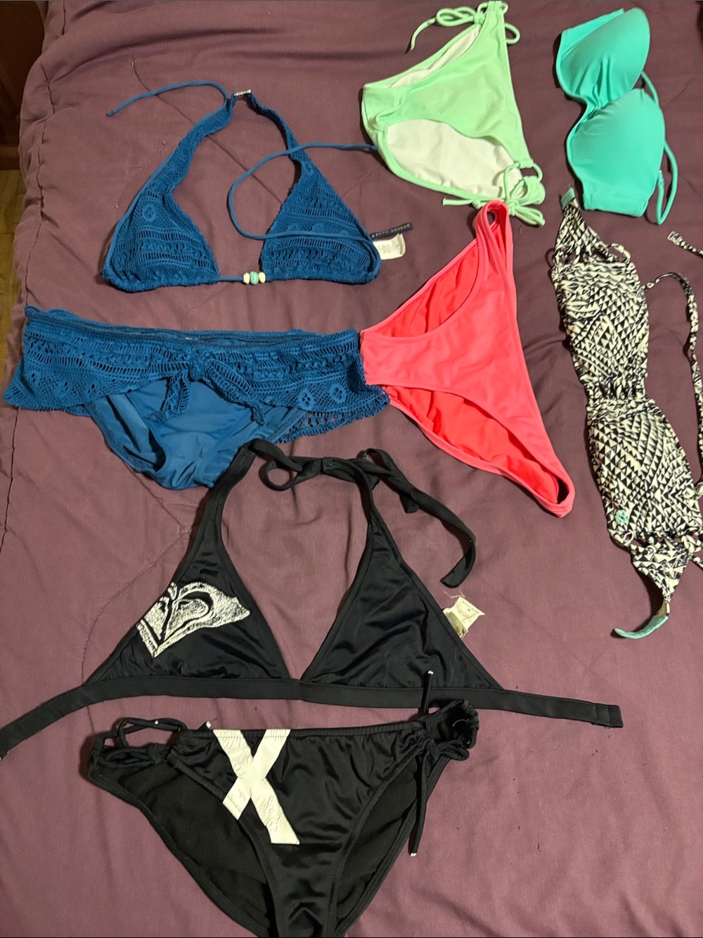 4 swimsuits (Roxy, Ralph Lauren, Victoria’s Secret, Volcom)